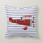 Striped Dog in Airplane Throw Pillow<br><div class="desc">This cute throw pillow has a navy striped background and a sweet little dog in a big red plane to get your little one thinking about fun adventures. Part of the Over the Garden Gate collection.</div>