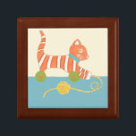 Striped Toy Cat with Ball of String Gift Box<br><div class="desc">Who wants to play with this striped toy cat by Chariklia Zarris? If only it were a real toy and not a print you could drag it around by the ball of attached string or push it along using the wheels underneath. A great gift for a child's nursery, order your...</div>