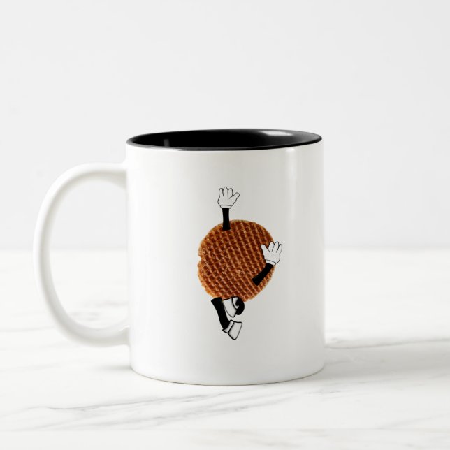 Stroopwafel jumping for joy. Two-Tone coffee mug (Left)