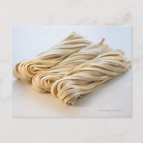 Studio shot of fresh linguini pasta postcard