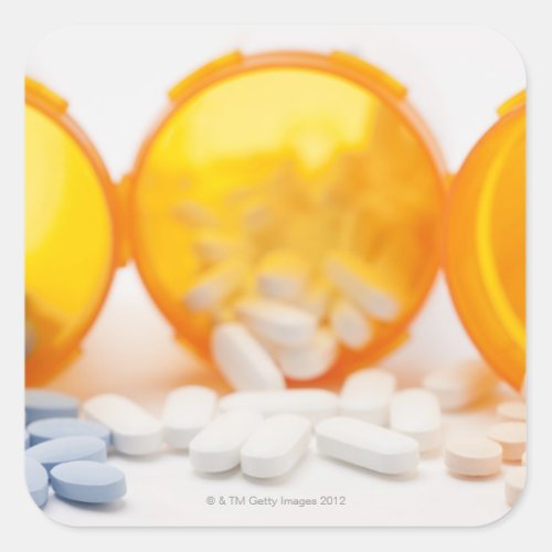 Studio shot of medicine bottle with pills square sticker