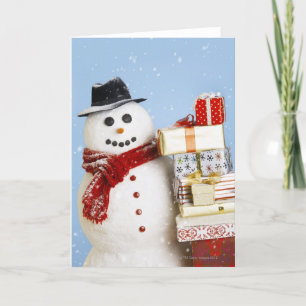 Studio shot of snowman with Christmas presents Holiday Card