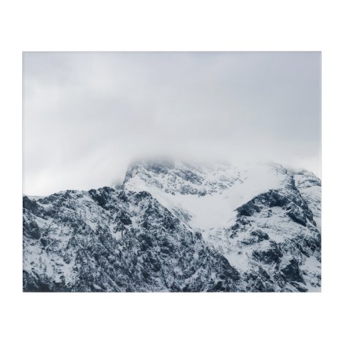 Stunning snowy mountains covered by clouds acrylic print