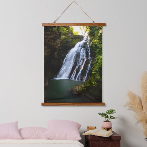 Stunning waterfall with sunlight glow hanging tapestry