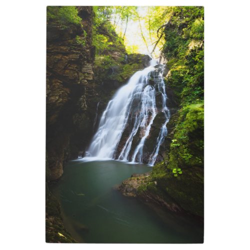 Stunning waterfall with sunlight glow metal print