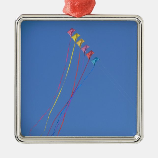Stunt Kite Flying in the Sky Metal Ornament (Front)