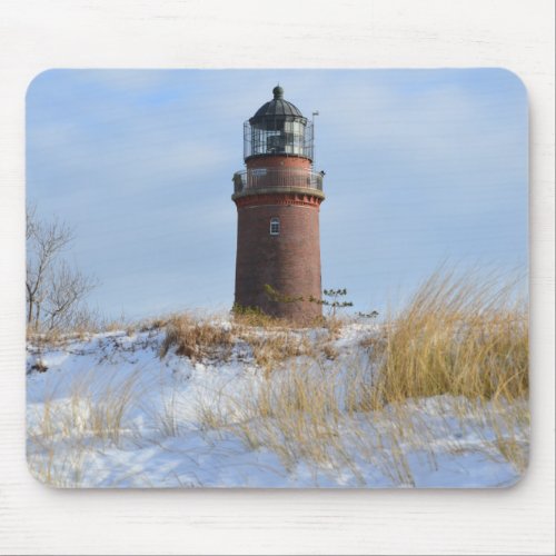 Sturdy Lighthouse on a Rocky Coast in Winter Mouse Pad