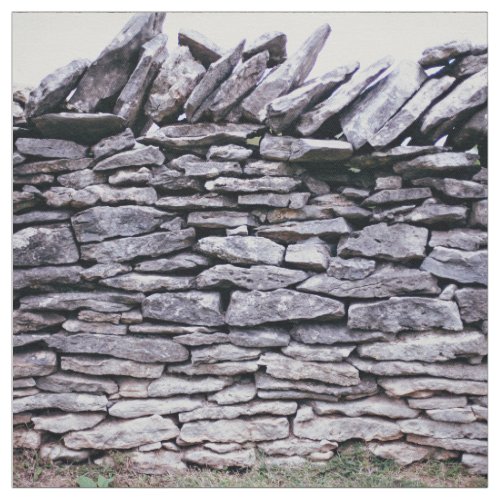 sturdy stacked stones fence fabric