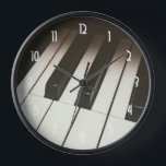 Stylish Black & White Piano Keys Photograph Clock<br><div class="desc">A clock with a musical themed photograph featuring up close image of piano keys. Stylish and elegant.</div>