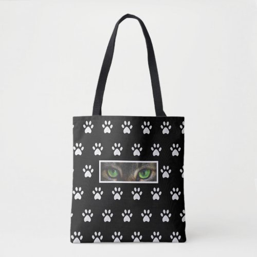 Stylish cat eyes and paw pattern on black  white tote bag