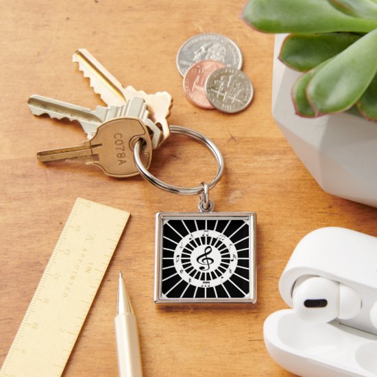 Stylish circular black white musical notes design keychain