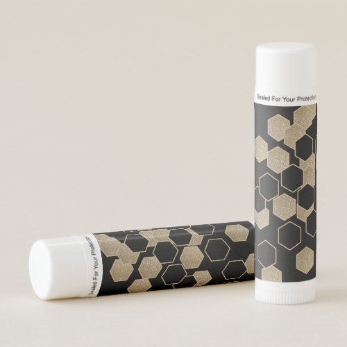 stylish geometric black and gold hexagon pattern lip balm