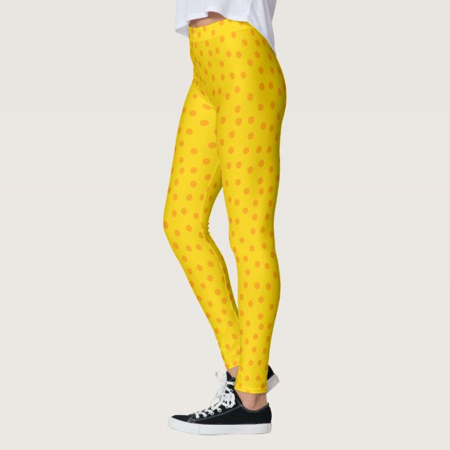 Stylish Gold Leggings with Orange Marked Pattern (Left)