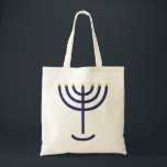 Stylish Menorah Navy Gold Tote Bag<br><div class="desc">Stylish Menorah Navy Gold tote. What a great idea for Sukkot! This handy tote features a stylish navy and gold Menorah. The golden Menorah is mentioned in the Bible in Exodus 25:31 ... it reads... And thou shalt make a candlestick of pure gold: of beaten work shall the candlestick be made:...</div>