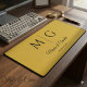 Metallic gold couple monogram desk mat