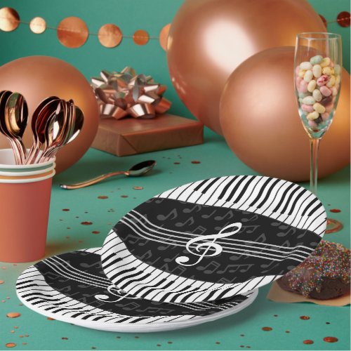 Stylish musical note clef and piano keys paper plates