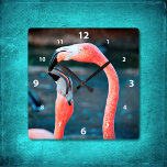 Stylish pink flamingo best friends photo modern square wall clock<br><div class="desc">Who says flamingos can’t have fun with their favorite pal? Enliven up your favorite room with this stunning, colorful photography wall clock of two flamingos playing around. Your choice of a round or square clock face. Makes a great housewarming gift! You can easily personalize this wall clock plus I also...</div>