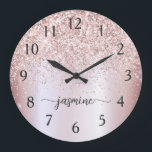 Stylish Rose Gold Glitter Monogram Name Signature Large Clock<br><div class="desc">Girly Glam Blush Rose Gold Glitter Metallic Monogram Name Script Custom Personalized Large Clock. These design featuring your first name in a pretty hand lettered style swash tail font signature typography on blush pink rose gold faux metallic foil with glam sparkle glitter border. These are easy to customize it. Great...</div>