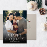 Stylish Typography Happy Holidays Photo Holiday Card<br><div class="desc">These stylish holiday photo greeting cards feature a full bleed photo template, elegant modern typography reading, "Happy Holidays, " and a little hand drawn floral design on the inside in classic Christmas colors of deep green, burgundy red, and ivory over a sand / beige background. Easy to personalize for beautiful...</div>