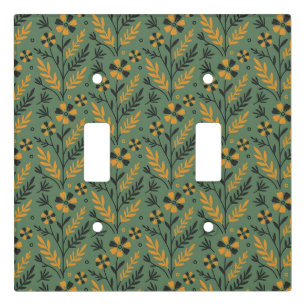 Stylized botanical orange and black floral pattern light switch cover