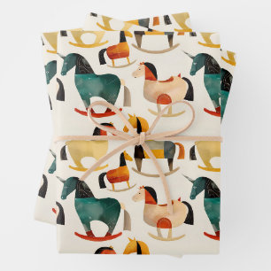 Stylized rocking horses wrapping paper sheets