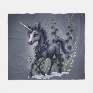 Stylized unicorn in floral splendor. fleece blanket