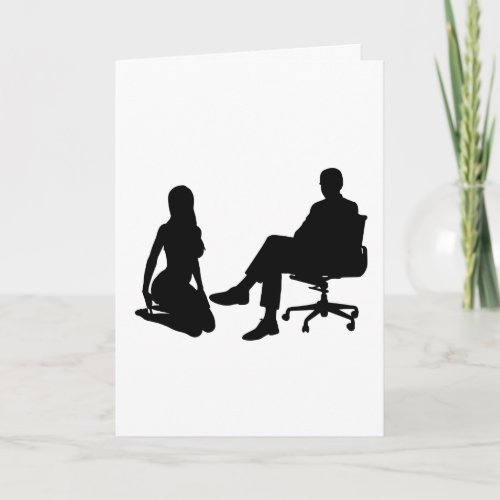 SUBMISSIVE WOMAN KNEELING BEFORE MAN IN CHAIR CARD