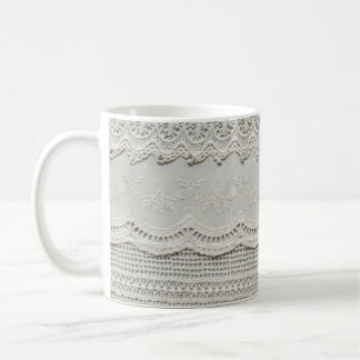 Subtle white lace, textile close-up. coffee mug