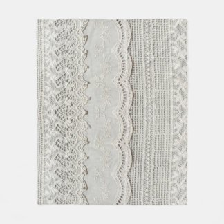 Subtle white lace, textile close-up. fleece blanket
