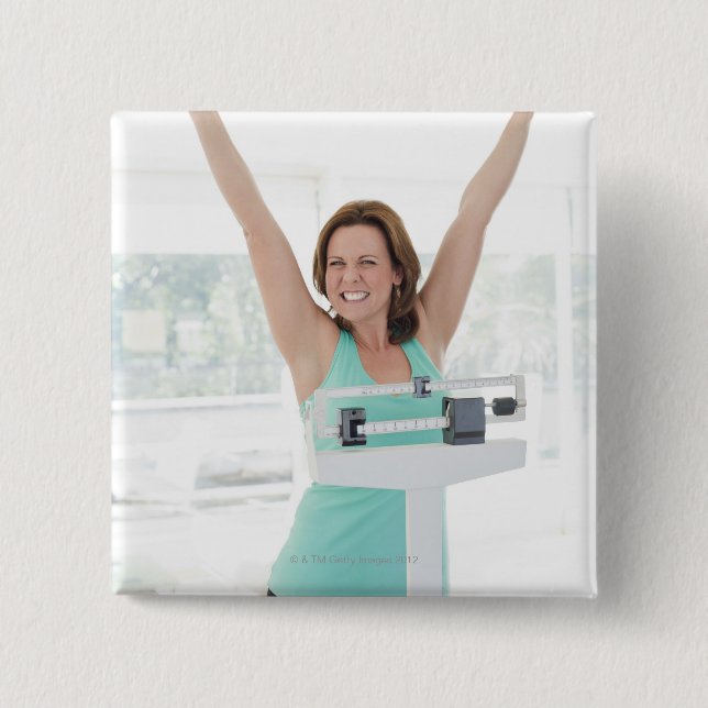 Successful weight loss. Happy woman weighing Pinback Button (Front)