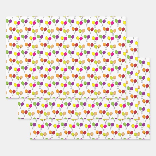 Suckers lollipops in green, purple, pink, yellow wrapping paper sheets (Set)