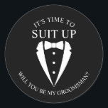 "SUIT UP" Black Tuxedo Suit Groomsman Proposal Classic Round Sticker<br><div class="desc">Make Your Wedding Unforgettable – Add a personal touch with a groomsman proposal sticker
featuring a black tuxedo suit and bow tie illustration with groomsmen proposal message in a classic serif font.</div>