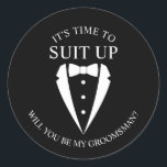 "SUIT UP" Black Tuxedo Suit Groomsman Proposal Classic Round Sticker<br><div class="desc">Make Your Wedding Unforgettable – Add a personal touch with a groomsman proposal sticker
featuring a black tuxedo suit and bow tie illustration with groomsmen proposal message in a classic serif font.</div>