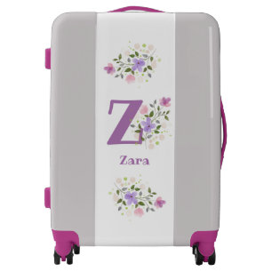 Suitcase has First Initial Plus Name with Flowers