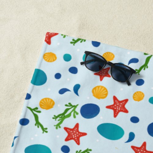 Summer beach with starfish shells and pebbles beach towel