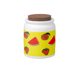 Summer fruits on yellow candy jar