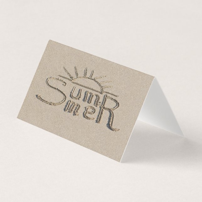 Summer sign carved on the beach sand (Front)