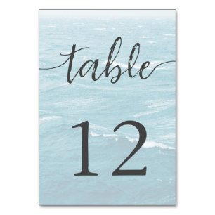 Summer wedding by the blue wavy sea ombre ocean table number