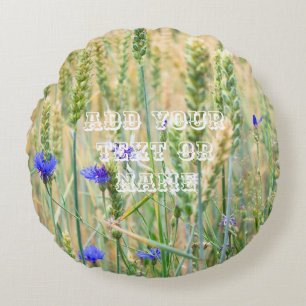 Summer wheat field with blue cornflowers round pillow