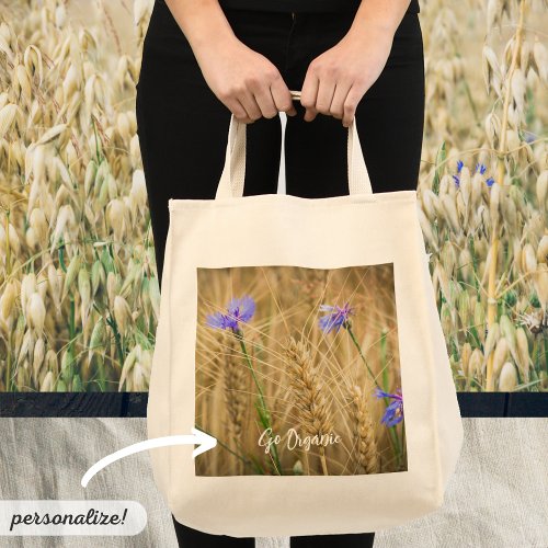 Summer wheat field with blue cornflowers tote bag