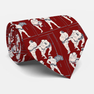 Sumo wrestlers in preparation neck tie
