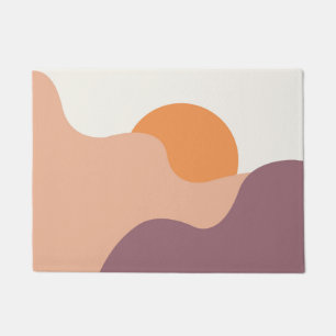 Sun goes down behind the purple hills doormat