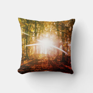 Sun in  the autumn forest throw pillow