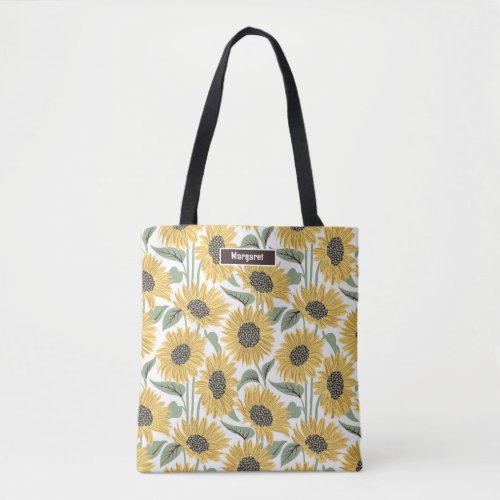 Sun_kissed sunflowers  yellow flower sage leaves tote bag