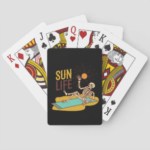 Sun Life Skeleton on a set of  Poker Cards