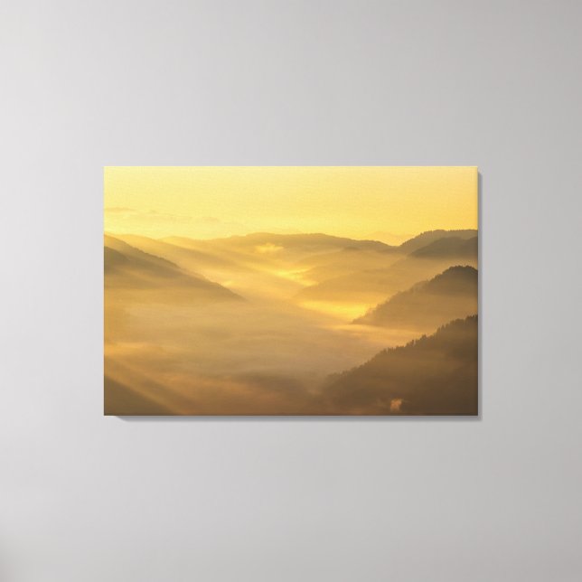 Sun light shining on morning fog canvas print (Front)