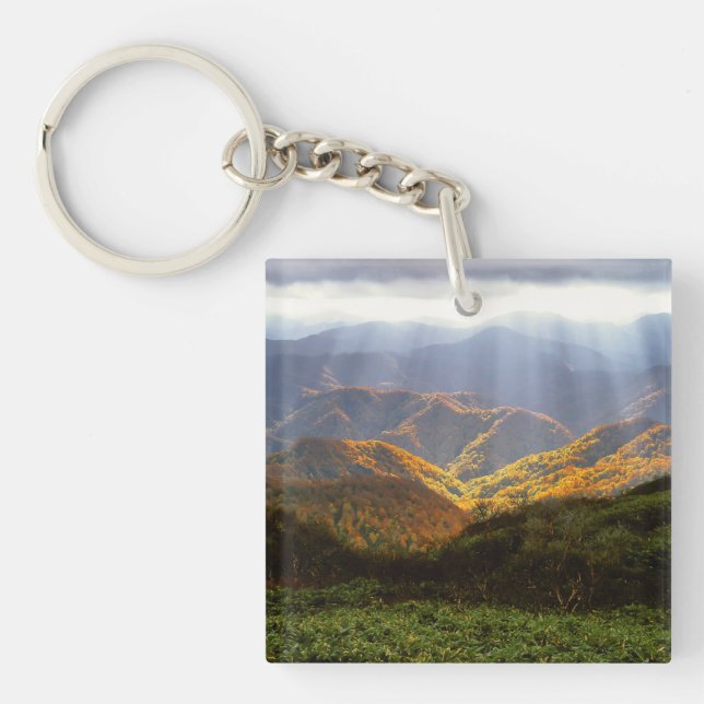 Sun Rays Over Shirakami-Sanchi Mountains Keychain (Front)