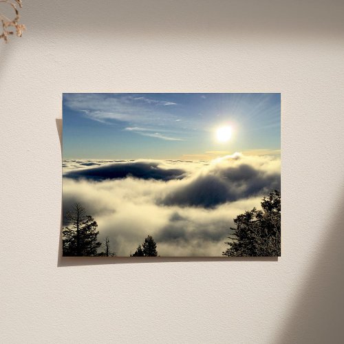 Sun rising above the clouds over Colorado Springs Poster