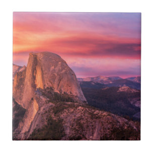 Sun Setting over A Rocky Landscape Ceramic Tile