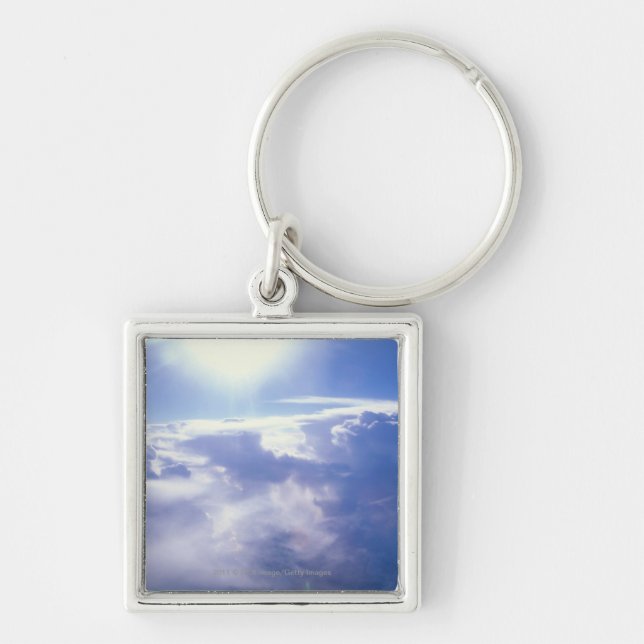 Sun shinning through clouds keychain (Front)